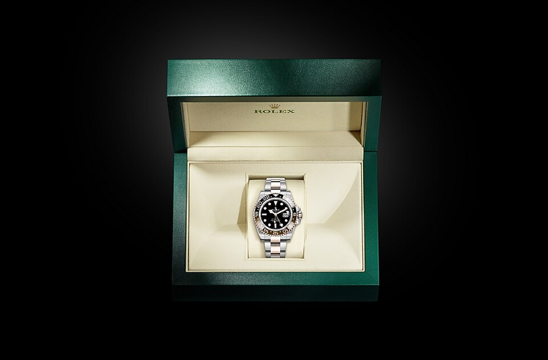 Rolex GMT-Master II watch in Oystersteel and gold and Dark dial at John Pass, official Rolex retailer. Ref: M126711CHNR-0002, in box