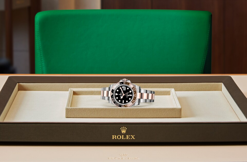 Rolex GMT-Master II watch in Oystersteel and gold and Dark dial at John Pass, official Rolex retailer. Ref: M126711CHNR-0002, on tray
